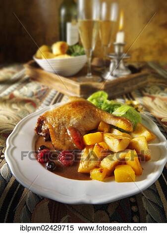 Stock Photography - Traditional roast Gresham duck dinner. Fotosearch