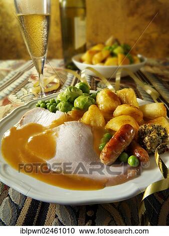 Stock Image - Traditional roast turkey dinner. Fotosearch