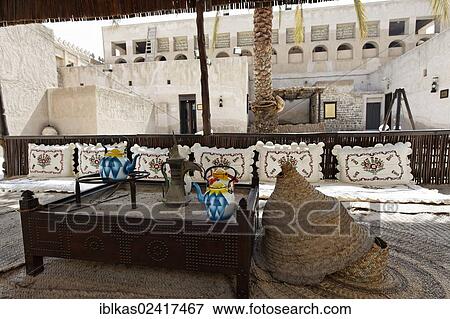 Traditional seating area with straw mats in the courtyard, typical residential dwelling of the Emirates, Heritage House, Dubai, United Arab Emirates, Middle East, Asia View Large Photo Image Stock Photo - Traditional seating area with straw mats in the courtyard, typical residential dwelling of the Emirates, Heritage House, Dubai, United Arab Emirates, Middle East, Asia. Fotosearch