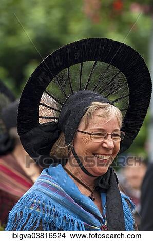 "Traditional Swiss costume, woman wearing a Radhaube headdress from the canton of Thurgau, Trachtenfest Interlaken costume festival, Switzerland, Europe" View Large Photo Image Picture - "Traditional Swiss costume, woman wearing a Radhaube headdress from the canton of Thurgau, Trachtenfest Interlaken costume festival, Switzerland, Europe". Fotosearch