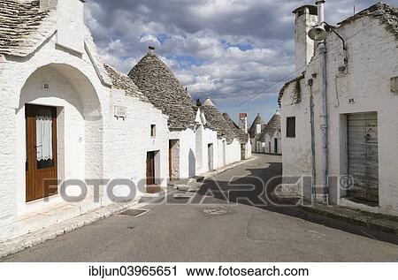 "Traditional Trulli or round houses, Rione Aia Piccola, Alberobello, Valle d'Itria, Trulli valley, Apulia, Italy, Europe" View Large Photo Image Stock Image - "Traditional Trulli or round houses, Rione Aia Piccola, Alberobello, Valle d'Itria, Trulli valley, Apulia, Italy, Europe". Fotosearch