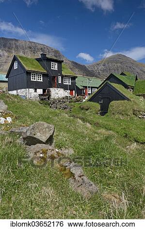 "Traditional turf houses, wooden houses with grass roofs and stone foundations, Gasadalur, Vagar, Faroe Islands, Denmark, Europe" View Large Photo Image Stock Photograph - "Traditional turf houses, wooden houses with grass roofs and stone foundations, Gasadalur, Vagar, Faroe Islands, Denmark, Europe". Fotosearch