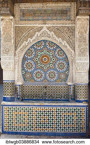 "Traditional water fountain with mosaics and stucco work, medina of Fes, Morocco, Africa" View Large Photo Image Picture - "Traditional water fountain with mosaics and stucco work, medina of Fes, Morocco, Africa". Fotosearch