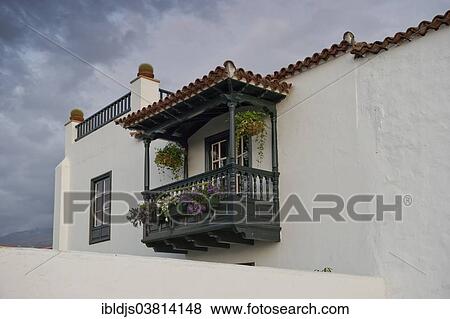 "Traditional white house with a wood balcony, Puerto de La Cruz, Tenerife, Canary Islands, Spain, Europe" View Large Photo Image Stock Photo - "Traditional white house with a wood balcony, Puerto de La Cruz, Tenerife, Canary Islands, Spain, Europe". Fotosearch