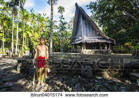 "Traditionally dressed boy standing in front of a traditional hut, Yap Island, Caroline Islands, Micronesia, Oceania" View Large Photo Image Picture - "Traditionally dressed boy standing in front of a traditional hut, Yap Island, Caroline Islands, Micronesia, Oceania". Fotosearch