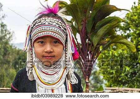 "Traditionally dressed girl from the Akha people, hill tribe, ethnic minority, portrait, Chiang Rai Province, Northern Thailand, Thailand, Asia" View Large Photo Image Stock Photo - "Traditionally dressed girl from the Akha people, hill tribe, ethnic minority, portrait, Chiang Rai Province, Northern Thailand, Thailand, Asia". Fotosearch