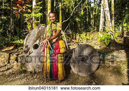 "Traditionally dressed girl standing in front of stone money, Yap Island, Caroline Islands, Micronesia, Oceania" View Large Photo Image Stock Image - "Traditionally dressed girl standing in front of stone money, Yap Island, Caroline Islands, Micronesia, Oceania". Fotosearch