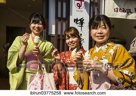 "Traditionally dressed girls eating icecream, Kyoto, Japan, Asia" View Large Photo Image Stock Photo - "Traditionally dressed girls eating icecream, Kyoto, Japan, Asia". Fotosearch