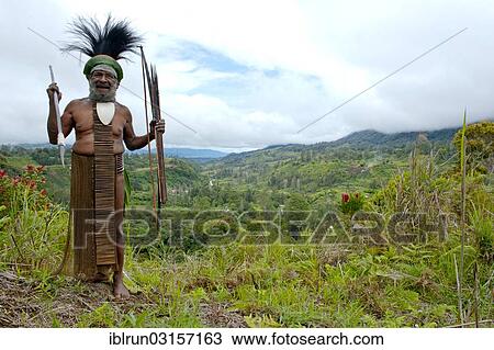 Stock Image - "Traditionally dressed tribal chief in the Highlands, Paya, Highland, Papua New Guinea, Oceania". Fotosearch