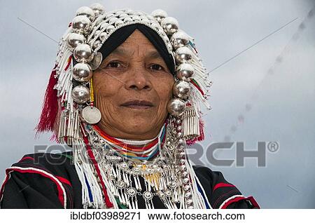 "Traditionally dressed woman from the Akha people, hill tribe, ethnic minority, portrait, Chiang Rai Province, Northern Thailand, Thailand, Asia" View Large Photo Image Stock Image - "Traditionally dressed woman from the Akha people, hill tribe, ethnic minority, portrait, Chiang Rai Province, Northern Thailand, Thailand, Asia". Fotosearch