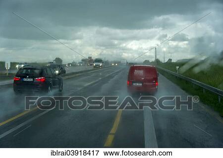 Stock Photo - "Traffic during heavy rain and poor visibility, A9 motorway, near Pfaffenhofen, Upper Bavaria, Bavaria, Germany, Europe". Fotosearch