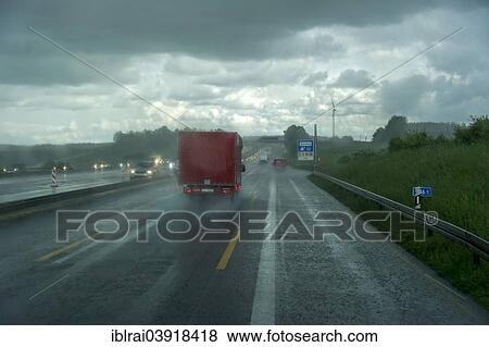 "Traffic during heavy rain and poor visibility, A9 motorway, near Pfaffenhofen, Upper Bavaria, Bavaria, Germany, Europe" View Large Photo Image Stock Photo - "Traffic during heavy rain and poor visibility, A9 motorway, near Pfaffenhofen, Upper Bavaria, Bavaria, Germany, Europe". Fotosearch