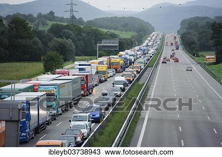 "Traffic jam after a massive traffic accident on the A8 motorway where a truck crushed a car, leaving two dead, near Kirchheim Teck, Baden-Wurttemberg, Germany, Europe" View Large Photo Image Stock Image - "Traffic jam after a massive traffic accident on the A8 motorway where a truck crushed a car, leaving two dead, near Kirchheim Teck, Baden-Wurttemberg, Germany, Europe". Fotosearch