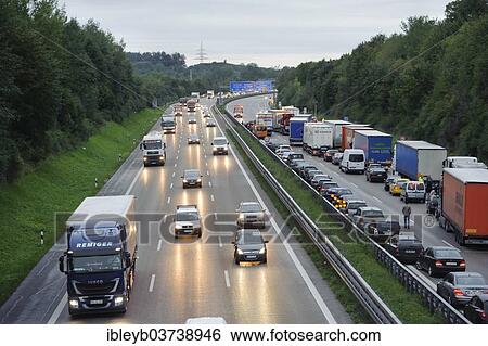 "Traffic jam after a massive traffic accident on the A8 motorway where a truck crushed a car, leaving two dead, near Kirchheim Teck, Baden-Wurttemberg, Germany, Europe" View Large Photo Image Stock Photograph - "Traffic jam after a massive traffic accident on the A8 motorway where a truck crushed a car, leaving two dead, near Kirchheim Teck, Baden-Wurttemberg, Germany, Europe". Fotosearch