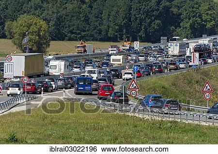Stock Photograph - "Traffic jam at a construction site at Autobahnkreuz Neufahrn interchange, Autobahnkreuz Neufahrn, Neufahrn, Lkr, Freising, Upper Bavaria, Bavaria, Germany, Europe". Fotosearch