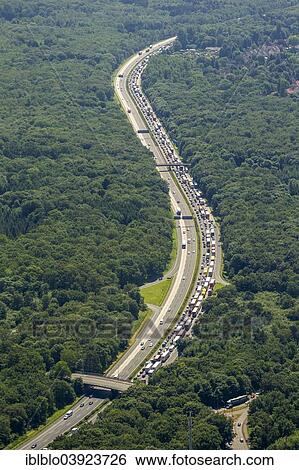 "Traffic jam on the A3 motorway, in the aftermath of damage caused by a storm on 9 June 2014, aerial view, Duisburg, Ruhr Area, North Rhine-Westphalia, Germany, Europe" View Large Photo Image Stock Photograph - "Traffic jam on the A3 motorway, in the aftermath of damage caused by a storm on 9 June 2014, aerial view, Duisburg, Ruhr Area, North Rhine-Westphalia, Germany, Europe". Fotosearch