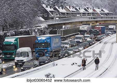 "Traffic jam on the A40 motorway in winter, """"Ruhrschnellweg"""" Autobahn, Essen, North Rhine-Westphalia, Germany, Europe" View Large Photo Image Stock Image - "Traffic jam on the A40 motorway in winter, """"Ruhrschnellweg"""" Autobahn, Essen, North Rhine-Westphalia, Germany, Europe". Fotosearch