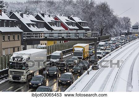 "Traffic jam on the A40 motorway in winter, """"Ruhrschnellweg"""" Autobahn, Essen, North Rhine-Westphalia, Germany, Europe" View Large Photo Image Stock Image - "Traffic jam on the A40 motorway in winter, """"Ruhrschnellweg"""" Autobahn, Essen, North Rhine-Westphalia, Germany, Europe". Fotosearch