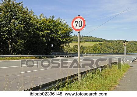 "Traffic sign, 70 kmh speed limit, Speed limit enforcement, traffic control, country road, Talbruecke Ronnewinkel bridge, Olpe, Ebbegebirge nature park Park, Sauerland, North Rhine-Westphalia, Germany, Europe, PublicGround, Europe" View Large Photo Image Stock Photo - "Traffic sign, 70 kmh speed limit, Speed limit enforcement, traffic control, country road, Talbruecke Ronnewinkel bridge, Olpe, Ebbegebirge nature park Park, Sauerland, North Rhine-Westphalia, Germany, Europe, PublicGround, Europe". Fotosearch