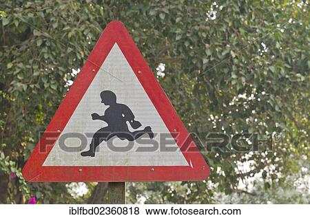 "Traffic sign showing a running person, Jorhat, India, Asia" View Large Photo Image Stock Photo - "Traffic sign showing a running person, Jorhat, India, Asia". Fotosearch