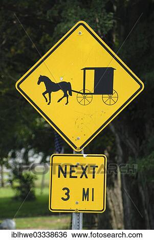 "Traffic sign """"warning horse-drawn carriage"""" of the Amish, Elk Creek, Erie County, Pennsylvania, United States, North America" View Large Photo Image Stock Photograph - "Traffic sign """"warning horse-drawn carriage"""" of the Amish, Elk Creek, Erie County, Pennsylvania, United States, North America". Fotosearch