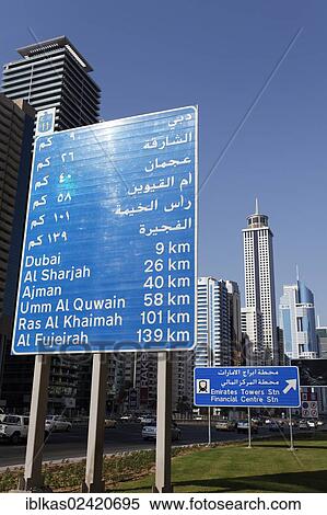 Traffic signs on Sheikh Zayed Road, distances to Al Sharjah, Ajman, Umm Al Quwain, Ras Al Khaimah and Al Fujairah, Dubai, United Arab Emirates, Middle East, Asia View Large Photo Image Stock Photography - Traffic signs on Sheikh Zayed Road, distances to Al Sharjah, Ajman, Umm Al Quwain, Ras Al Khaimah and Al Fujairah, Dubai, United Arab Emirates, Middle East, Asia. Fotosearch