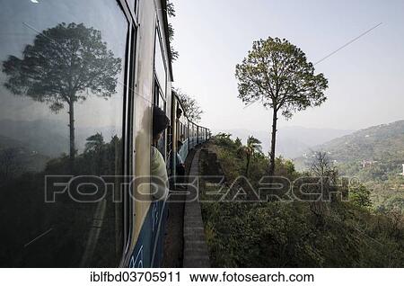 "Train of the Kalka–Shimla Railway, a narrow gauge railway, slowly winding its way up from Kalpa to Shimla, near Shimla, Himachal Pradesh, India, Asia" View Large Photo Image Stock Image - "Train of the Kalka–Shimla Railway, a narrow gauge railway, slowly winding its way up from Kalpa to Shimla, near Shimla, Himachal Pradesh, India, Asia". Fotosearch