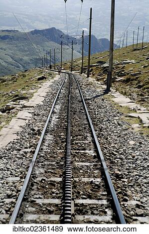 "Train tracks of the historic funicular from 1924 up to the summit of La Rhune Mountain, 905m, Basque Country, Pyrenees, Aquitaine region, department of Pyrenees-Atlantiques, France, Europe" View Large Photo Image Stock Photo - "Train tracks of the historic funicular from 1924 up to the summit of La Rhune Mountain, 905m, Basque Country, Pyrenees, Aquitaine region, department of Pyrenees-Atlantiques, France, Europe". Fotosearch