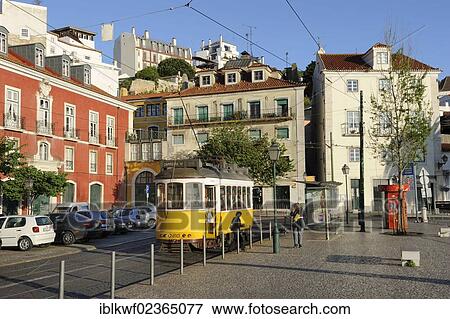 "Tram with narrow gauge for tight turns at the Lago das Portas do Sol, in the old town, Alfama, Lisbon, Portugal, Europe" View Large Photo Image Stock Photo - "Tram with narrow gauge for tight turns at the Lago das Portas do Sol, in the old town, Alfama, Lisbon, Portugal, Europe". Fotosearch