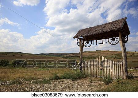 Stock Photo - "Transylvanian wooden gate at the entrance to a farm estate, bei Boz, Siebenburgen, Romania, Europe". Fotosearch