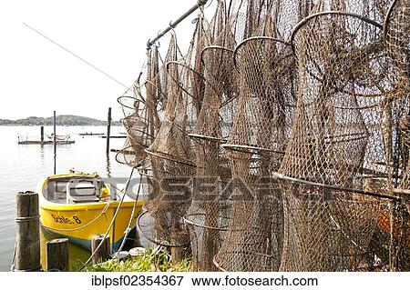 "Traps and nets in the Holm fishing quarter of Schleswig, Schleswig-Holstein, Germany, Europe" View Large Photo Image Stock Photo - "Traps and nets in the Holm fishing quarter of Schleswig, Schleswig-Holstein, Germany, Europe". Fotosearch