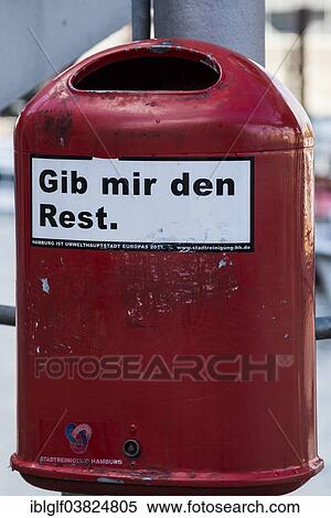 "Trash can with a sticker with the message """"Gib mir den Rest"""", German for """"Give me the rest"""", Speicherstadt, Hamburg, Germany, Europe" View Large Photo Image Stock Photography - "Trash can with a sticker with the message """"Gib mir den Rest"""", German for """"Give me the rest"""", Speicherstadt, Hamburg, Germany, Europe". Fotosearch