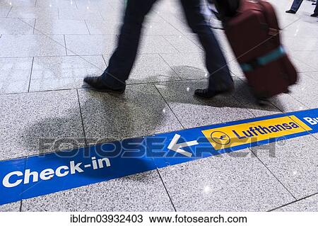 "Traveller with luggage at the airport, Dusseldorf, North Rhine-Westphalia, Germany, Europe" View Large Photo Image Stock Image - "Traveller with luggage at the airport, Dusseldorf, North Rhine-Westphalia, Germany, Europe". Fotosearch