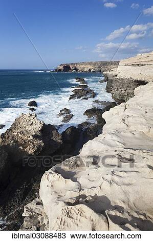 "Travertine terraces along the cliffs to the Mirador, Ajuy, Fuerteventura, Canary Islands, Spain, Europe" View Large Photo Image Stock Image - "Travertine terraces along the cliffs to the Mirador, Ajuy, Fuerteventura, Canary Islands, Spain, Europe". Fotosearch