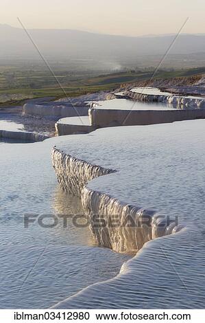 Stock Image - "Travertine terraces at Pamukkale, Pamukkale, Denizli Province, Aegean Region, Turkey, Asia". Fotosearch