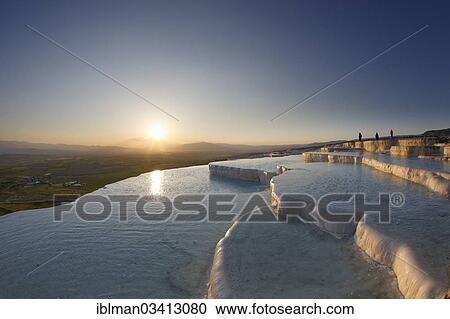 Stock Image - "Travertine terraces at Pamukkale, evening mood, Pamukkale, Denizli Province, Aegean Region, Turkey, Asia". Fotosearch