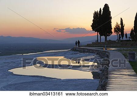 "Travertine terraces at Pamukkale, evening mood, dusk, Pamukkale, Denizli Province, Aegean Region, Turkey, Asia" View Large Photo Image Stock Image - "Travertine terraces at Pamukkale, evening mood, dusk, Pamukkale, Denizli Province, Aegean Region, Turkey, Asia". Fotosearch