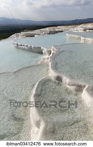 "Travertine terraces of Pamukkale, Pamukkale, Denizli Province, Aegean Region, Turkey, Asia" View Large Photo Image Stock Photograph - "Travertine terraces of Pamukkale, Pamukkale, Denizli Province, Aegean Region, Turkey, Asia". Fotosearch