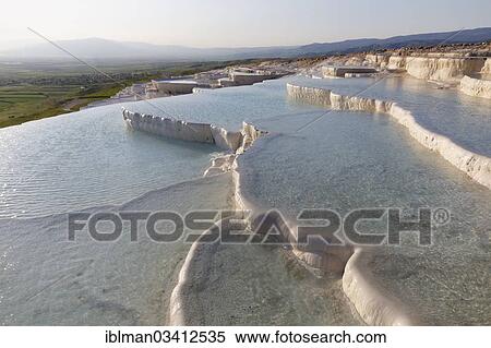 "Travertine terraces of Pamukkale, Pamukkale, Denizli Province, Aegean Region, Turkey, Asia" View Large Photo Image Stock Photography - "Travertine terraces of Pamukkale, Pamukkale, Denizli Province, Aegean Region, Turkey, Asia". Fotosearch