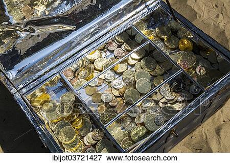 Treasure chest with gold and silver coins View Large Photo Image Stock Photo - Treasure chest with gold and silver coins. Fotosearch