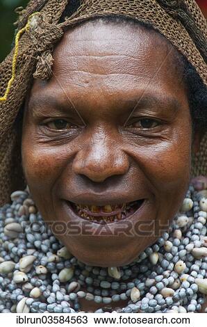 "Tribal woman wearing a traditional dress, Highlands Region, Papua New Guinea, Oceania" View Large Photo Image Stock Image - "Tribal woman wearing a traditional dress, Highlands Region, Papua New Guinea, Oceania". Fotosearch