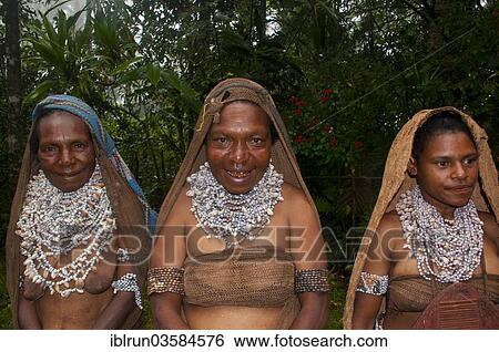 Stock Photograph - "Tribal women wearing traditional dresses, Highlands Region, Papua New Guinea, Oceania". Fotosearch