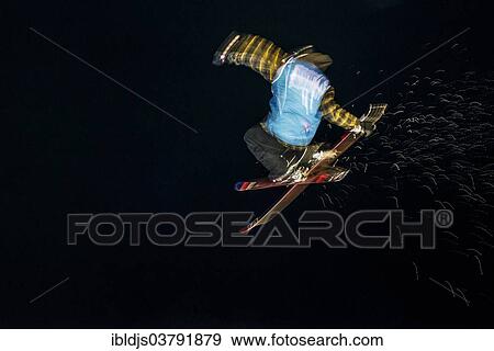 "Trick skier with motion blur, night shot, Murren, Bernese Oberland, Canton of Bern, Switzerland, Europe" View Large Photo Image Stock Photo - "Trick skier with motion blur, night shot, Murren, Bernese Oberland, Canton of Bern, Switzerland, Europe". Fotosearch