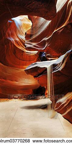 "Trickling sand, yellow and red sandstone formations, Upper Antelope Canyon, near Page, Arizona, USA" View Large Photo Image Stock Photo - "Trickling sand, yellow and red sandstone formations, Upper Antelope Canyon, near Page, Arizona, USA". Fotosearch