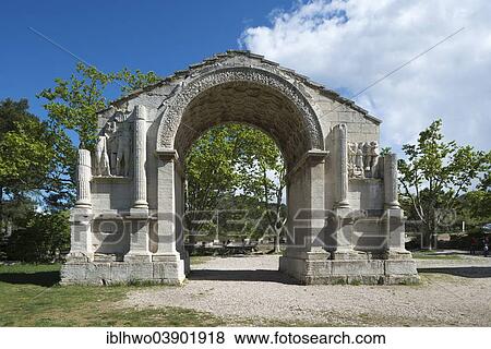 "Triumphal arch in the ancient Roman city of Glanum, later covered up with stone slabs, Saint-Remy-de-Provence, Provence-Alpes-Cote d'Azur, France, Europe" View Large Photo Image Stock Photo - "Triumphal arch in the ancient Roman city of Glanum, later covered up with stone slabs, Saint-Remy-de-Provence, Provence-Alpes-Cote d'Azur, France, Europe". Fotosearch