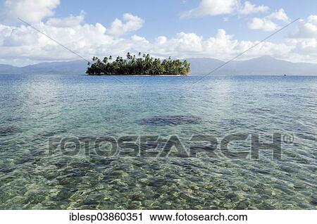Stock Image - "Tropical island with palm trees, Cayos Los Grullos, Mamartupo, San Blas Islands, Panama, North America". Fotosearch