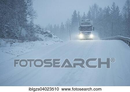 "Truck driving on snowy road, winter driving, Norway, Europe" View Large Photo Image Stock Image - "Truck driving on snowy road, winter driving, Norway, Europe". Fotosearch