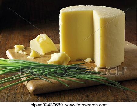 Truckle of English cheddar cheese View Large Photo Image Stock Photo - Truckle of English cheddar cheese. Fotosearch