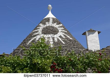 "Trullo house roof with traditional symbol, Alberobello, Puglia, Italy, Europe" View Large Photo Image Stock Image - "Trullo house roof with traditional symbol, Alberobello, Puglia, Italy, Europe". Fotosearch