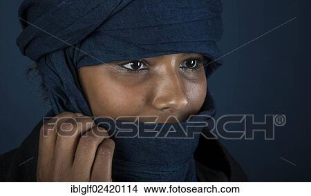 Tuareg girl, Targia, veiled with a chech, portrait, face shrouded mysteriously with her hand, Algeria, North Africa, Africa View Large Photo Image Picture - Tuareg girl, Targia, veiled with a chech, portrait, face shrouded mysteriously with her hand, Algeria, North Africa, Africa. Fotosearch